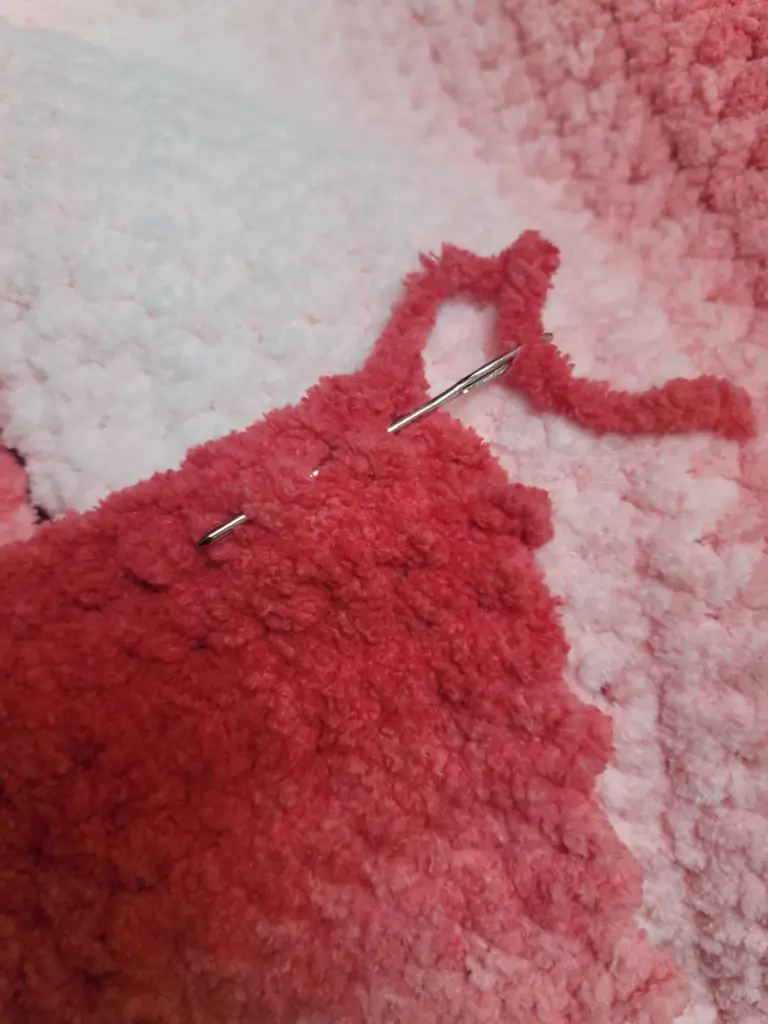 Perfect Phase Blanket in "Crimson" tapestry needle weaving in ends.