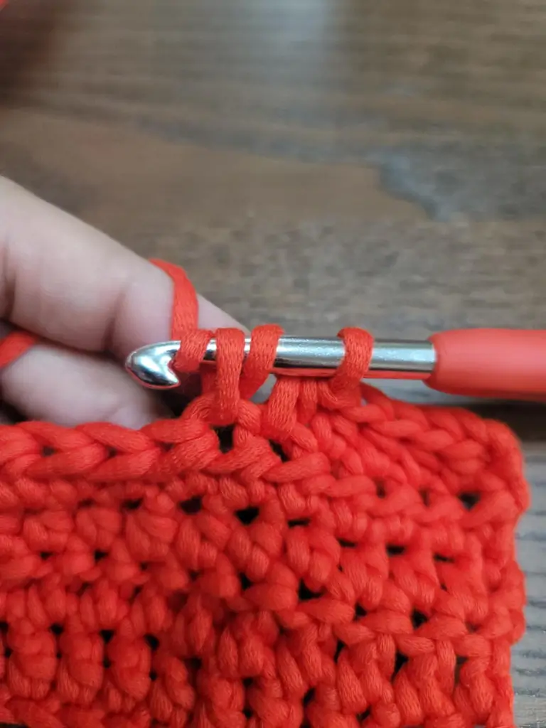 Picture of 3 loops on the crochet hook with a yarn over.